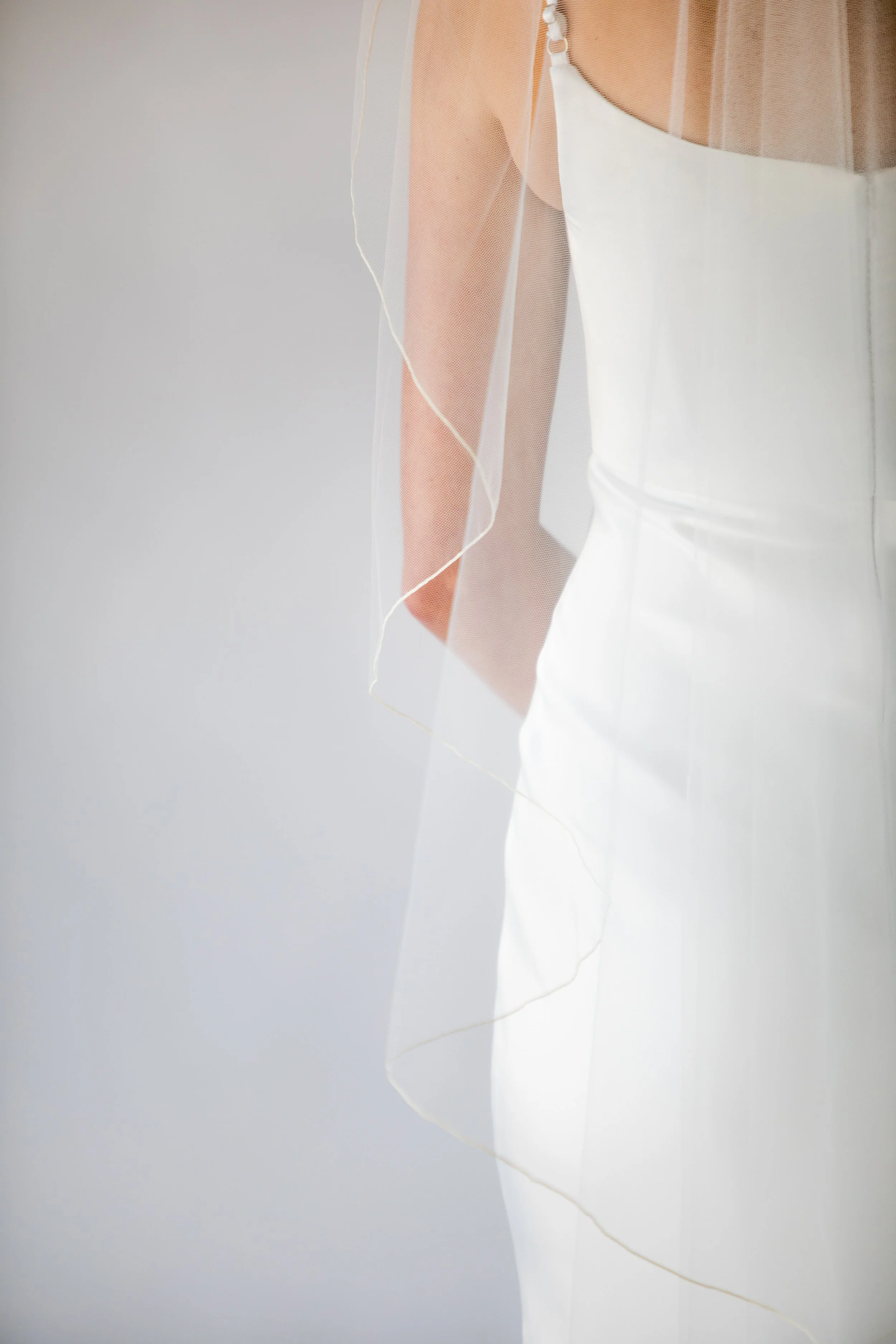 Bella wavy angel wing cut veil with stitched edge by Justine M